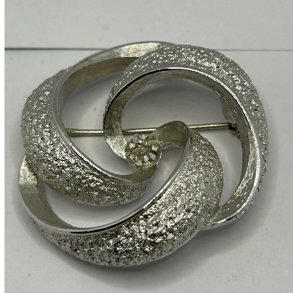 Vintage Monet Swirl Brooch Silver Tone Textured Knot Twist Pin Classic Timeless